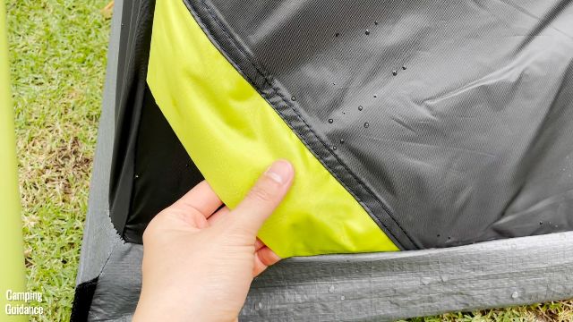 This is a picture of me touching the e-port of the Coleman 10-Person Instant Cabin Tent.