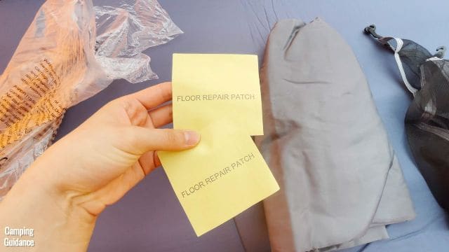 In this picture, you can see the 2 floor repair patches, the room divider (gray, middle), and the gear loft (black mesh, right).