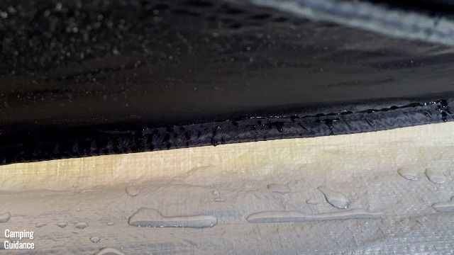 I noticed that the inverted seam connecting the black fabric of the Coleman 10-Person Instant Tent to the bathtub flooring was leaking.