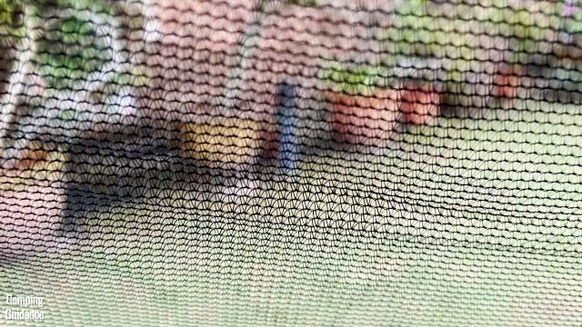 This is a picture of the mesh of the windows of the Coleman 10-Person Instant Cabin Tent.