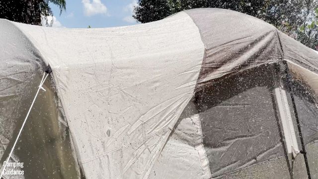 This is a picture of the rainfly of the WeatherMaster 10-Person Tent in the rain.