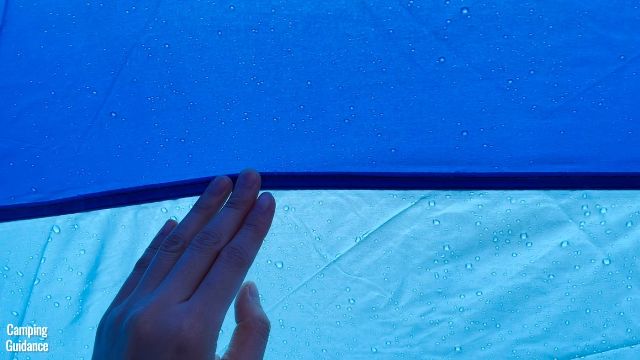 This is the stitching between the upper dark blue fabric and the bottom lighter blue fabric of the Columbia Mammoth Creek Tent.