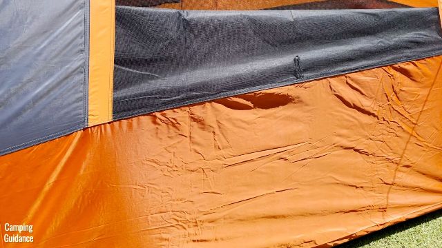 This is a picture of the outer tent body of the Core 10-Person Straight Wall Cabin Tent, which is made of 68D polyester.