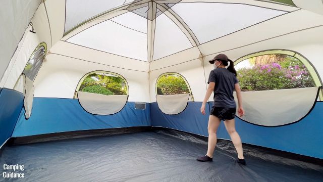 This is a picture of me opening 4 of the windows inside the Ozark Trail 10-Person Cabin Tent. All the windows are the same size.