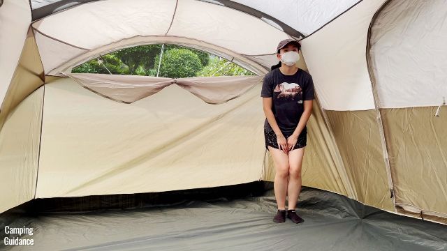 This is a picture of me standing at the corners of the WeatherMaster 10-Person Tent (excluding the small triangular spaces at the widths). 
