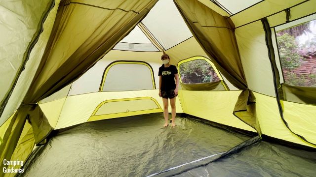 This is a picture of me standing in one of the corners of the Outdoor Products 10-Person Instant Cabin Tent. Notice I'm only standing upright because I'm about 1 foot away from the corner.