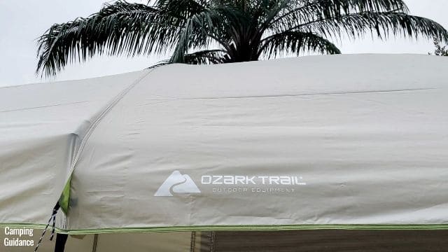 This is a picture of the Ozark Trail logo on the rainfly of the Ozark Trail 10-Person Cabin Tent.