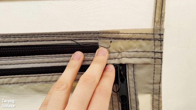 This is a picture of the stitching above the door of the Ozark Trail 10-Person Cabin Tent.