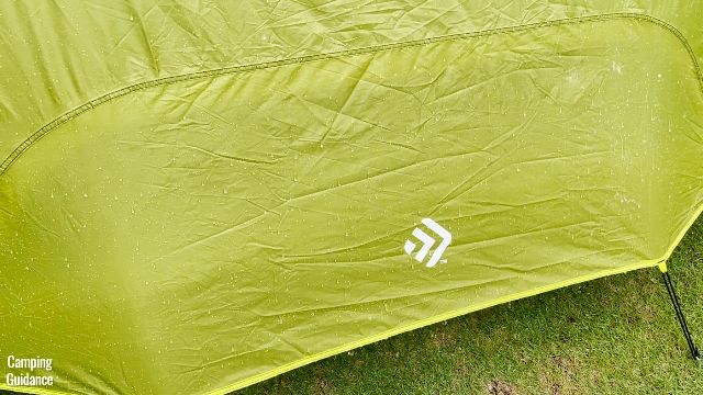 This is a picture of rain falling on the extra-large ground vent of the Outdoor Products 10-Person Instant Cabin Tent.