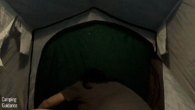 This is a picture of me inside my Quechua 2 Seconds Pop Up Tent at night. I’m zipping up the door.