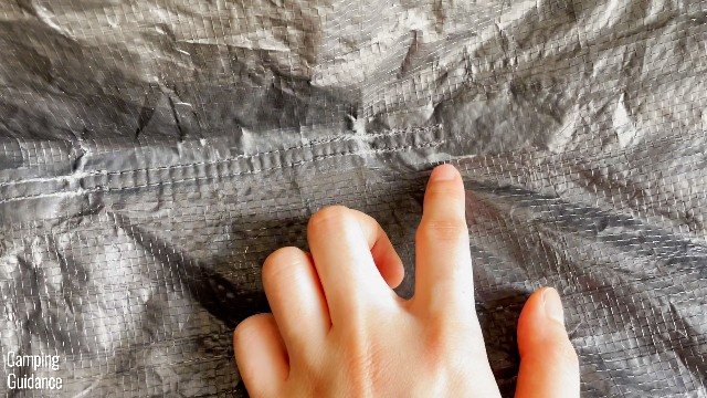 This is a picture of some of the floor seams of my Quechua 2 Seconds Fresh and Black Tent. Notice that it’s quite old, and the factory tape looks like it’s loosening and peeling off.