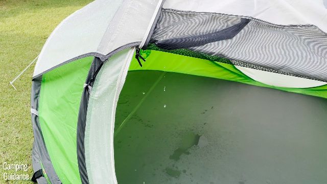 This is a picture of water dripping from the door of my Coleman Pop Up 2. Notice the puddles of water on the floor as well.