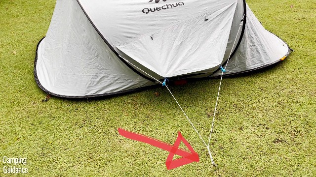 This is one of the side vents of the Quechua 2 Seconds Fresh and Black Tent. The red arrow is pointing to the pre-tied loop that you have to drive a stake through.