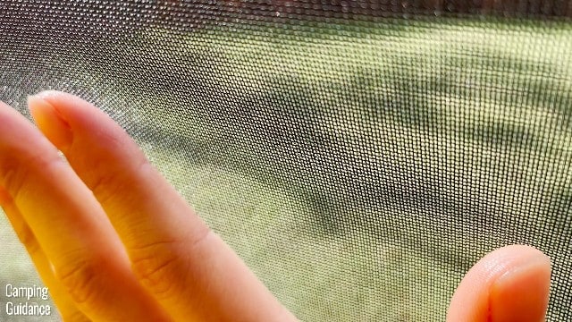 This is a picture of the micro mesh of the Teton Sports 1-Person Vista Quick Tent. I had to stick my hand in the photo to get my camera to focus.