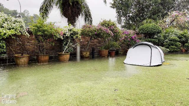 This is my Quechua 2 Seconds Fresh and Black Tent sitting in a partially flooded yard.