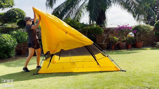 This is a picture of me taking the rainfly off the Teton Sports 2-Person Vista Quick Tent.