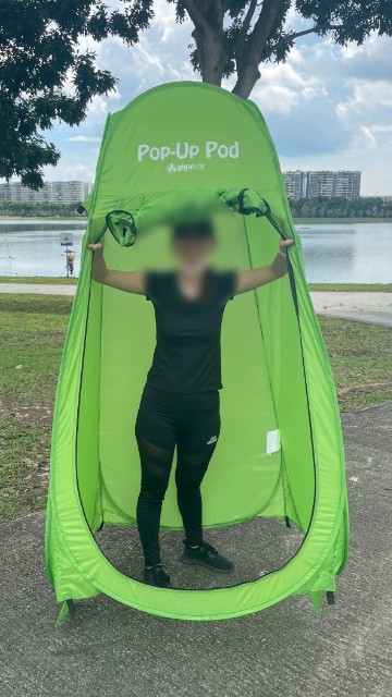 This is a picture of me in a privacy pop up tent.