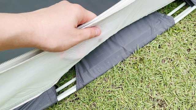 This is a picture of me touching the tent body of my Coleman 2-Person Pop Up Tent.