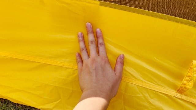 This is a picture of me touching the tent body of my Teton Sports 2-Person Vista Quick Tent.