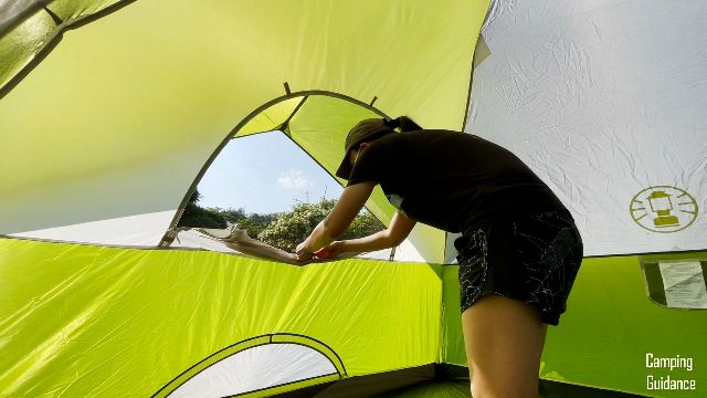The author opening up the back window of the Coleman Sundome 6