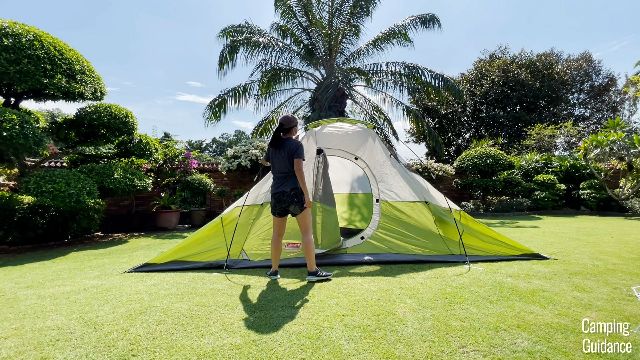 Here’s what the Coleman Montana 8-Person Tent will look like when the 2 main black fiberglass poles have been propped up and inserted into the pins.