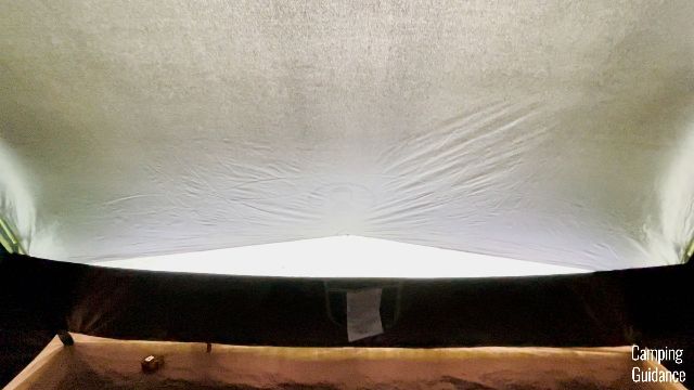 The mesh wall vents by the 2 widths of the Coleman Sundome Dark Room Tent let in a lot of light.