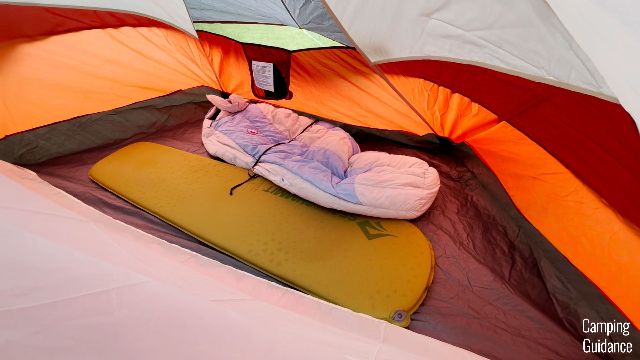 This is how much space there is behind each divider of the Coleman Red Canyon 8-Person Tent. Notice it fits just 2 sleeping pads/bags nicely.