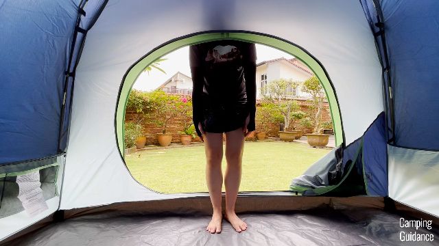 This is a picture of me standing in front of the door of the Coleman Skydome Tent.