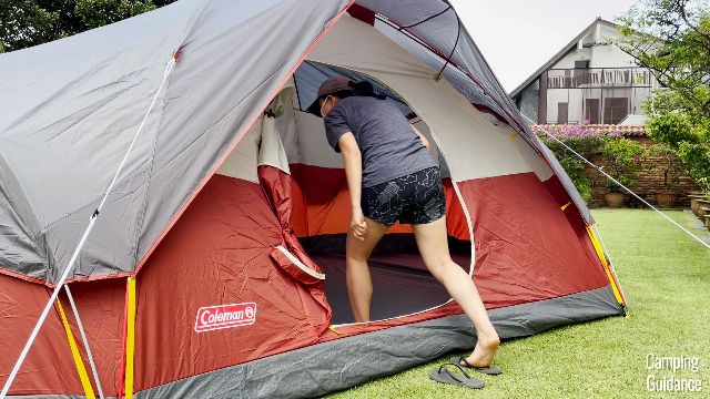 This is a picture of me ducking to get through the door of the Coleman Red Canyon 8-Person Tent.