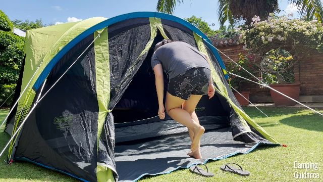 A picture of me ducking to get through the Carlsbad Tent’s screen room door.