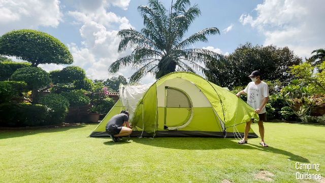 The rainfly pole of the Coleman Montana 8-Person Tent is to be bent into this semi-circle shape.