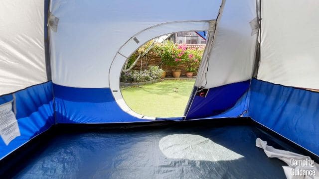 This is what the hinged D-door of the Coleman Elite Sundome Tent looks like when it’s opened.