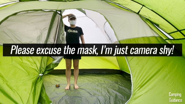 This is a picture of me standing under the peak height of the Coleman Evanston 6-Person Tent.