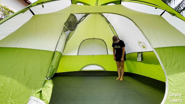 The author hunching over in one of the corners of the Coleman Sundome 6