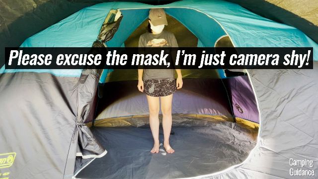 This is me standing under the peak height of the Coleman Carlsbad 4-Person Tent.