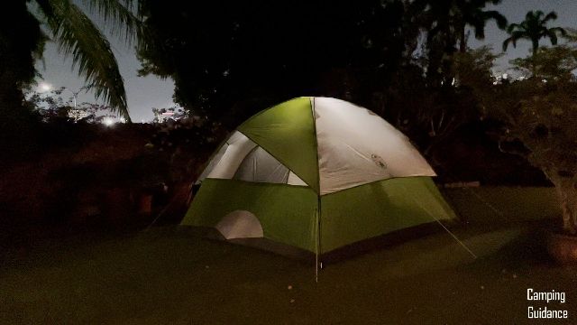 Here’s what the regular Coleman Sundome 6-Person Tent (without the dark room technology) looks like at night.