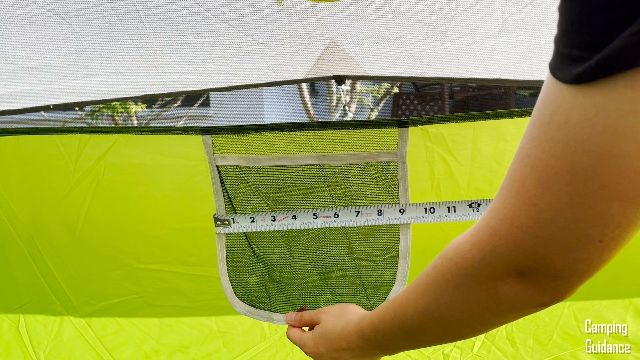 This is a picture of me measuring the dimensions of each pocket inside the Coleman Sundome 6.