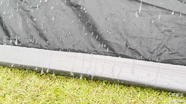 Water running over the bathtub flooring of the Coleman Instant Tent 4.