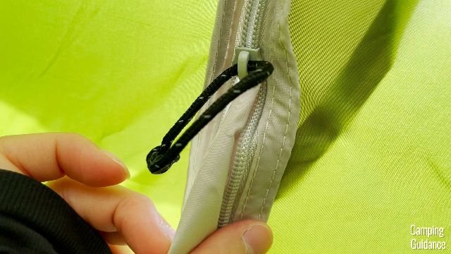 The rain cover from the outside has snagged on one of the door zippers of my Coleman Sundome 2.