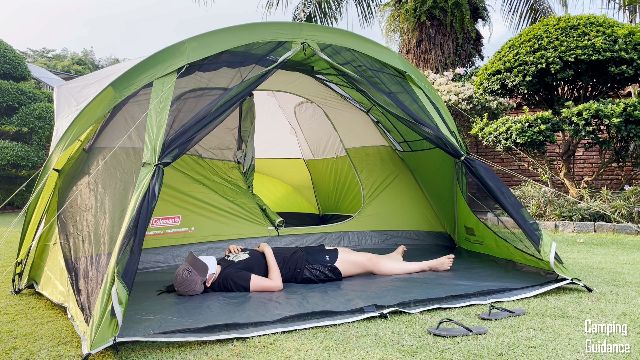 This is a picture of me lying down in the screen room of the Evanston 6-Person Tent. There’s actually space for even 2 of me!