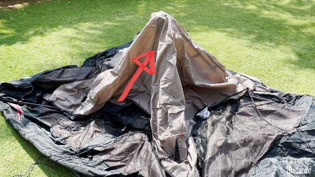 This is the Coleman Instant Tent 4 flat on the ground. The red arrow is pointing to the central hub.