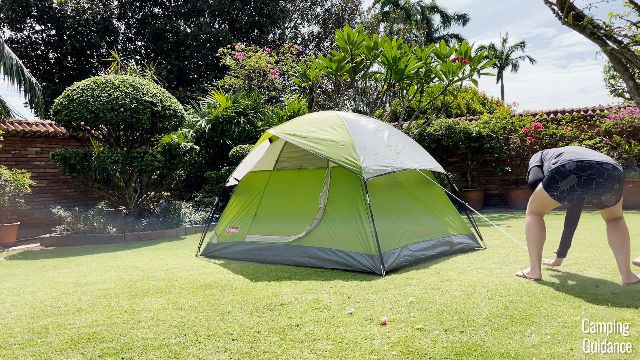 This is a picture of me guying out the Coleman Sundome 2-Person Tent.