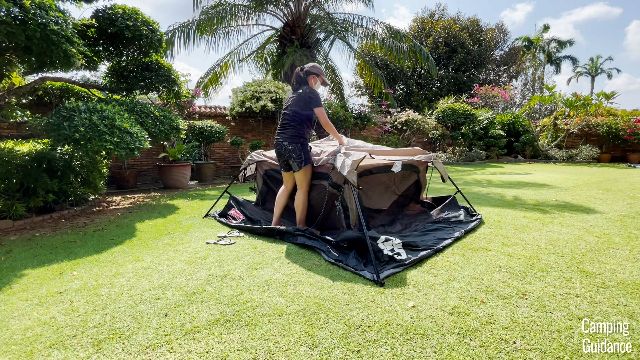 The Coleman Instant Tent 4 set up about halfway.
