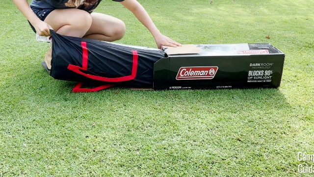 The author unboxing the Coleman Sundome Dark Room 6.