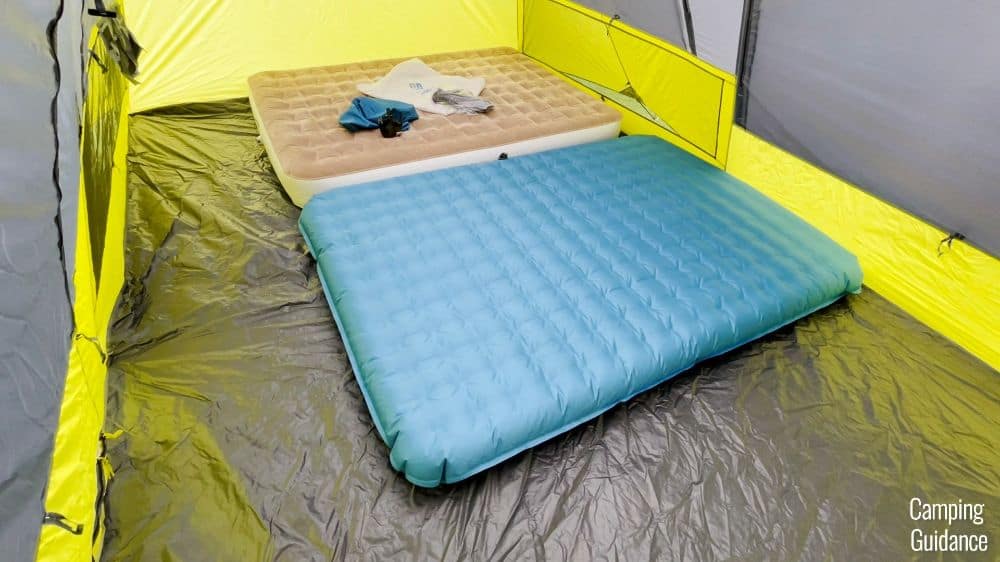 What 2 queen beds looks like inside the Core Instant Cabin 9.