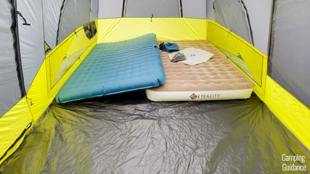 The width of the Core Instant Cabin 9 is too short to fit 2 queen beds side by side.