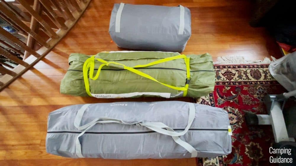 The Core Instant 9 (gray, bottom) next to the Outdoor Products Instant 10 (green, middle) and my Core Cabin 10 (gray, top).