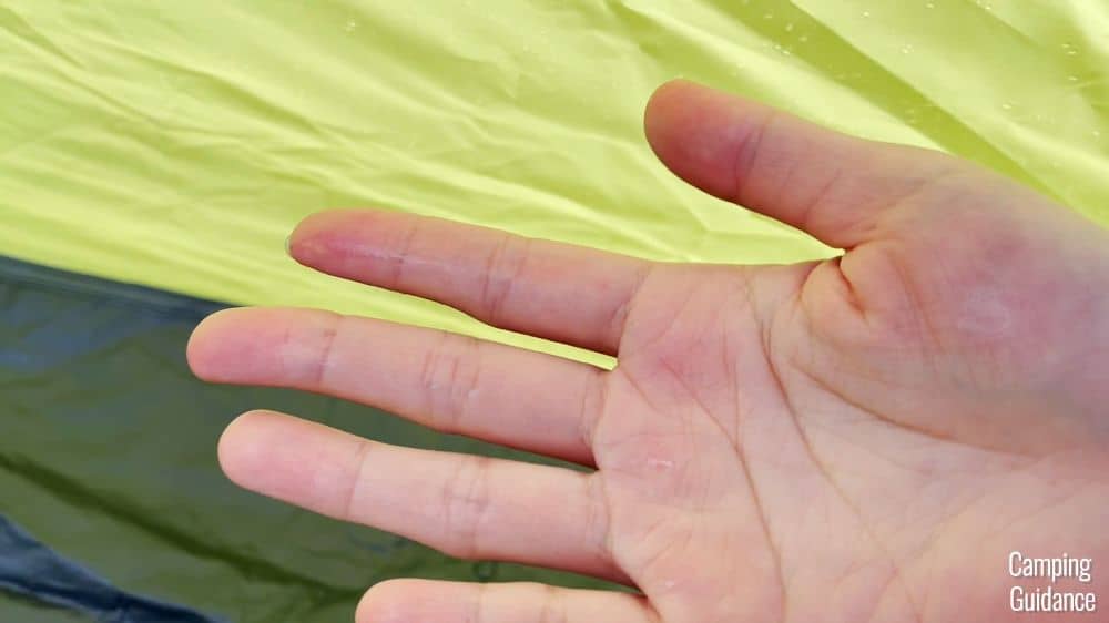 My hand is damp after touching the yellow/green fabric at the bottom of the Core Instant 9.