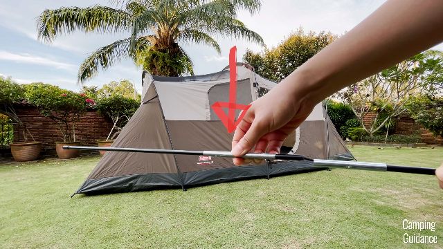 The red arrow is pointing to the part of the hinged door pole that I used duct tape on.