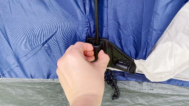 A close-up shot of the rubber gasket at the bottom of the hinged door.